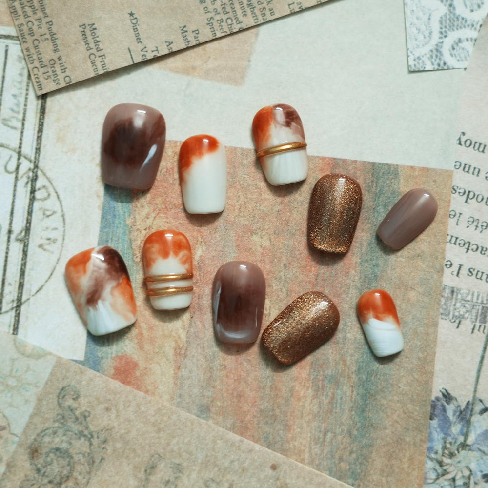 Tesytto handmade artisan nails offer high-gloss shine and reusable appeal.