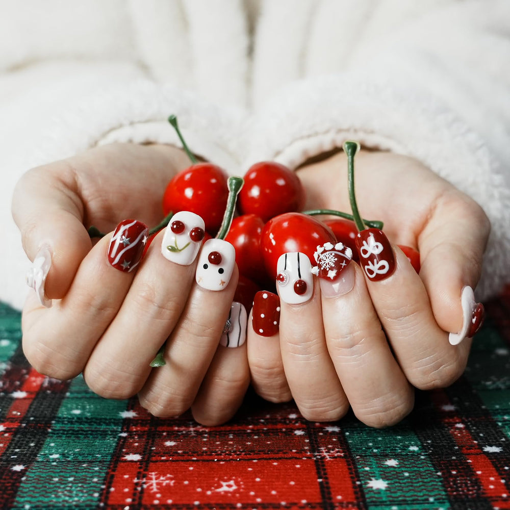 Tesytto nails with cherry apple accents adding whimsical charm