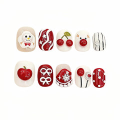 Tesytto nails showing glitter bows and stars for holiday sparkle