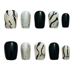Tesytto Marble press-on nails with zebra print and silver glitter for a bold glossy look