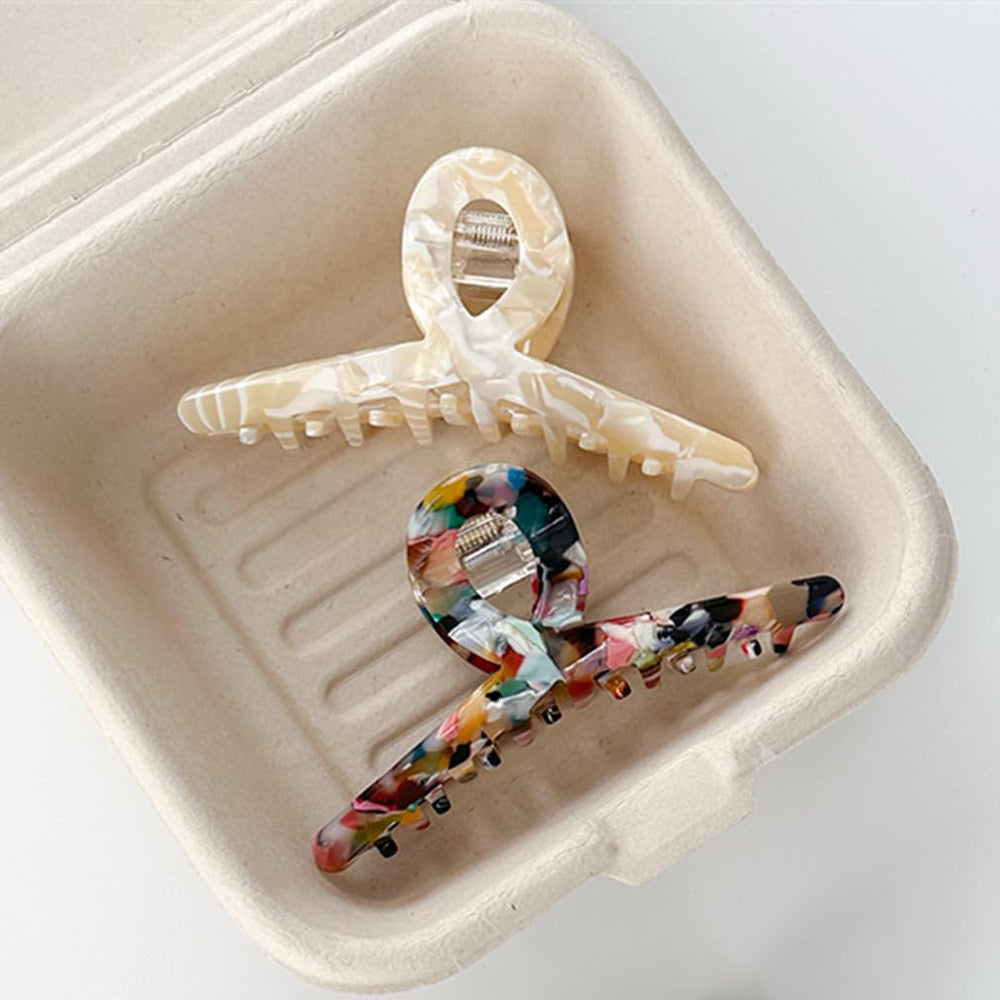 Textention stylish tortoise shell clip complements everyday outfits