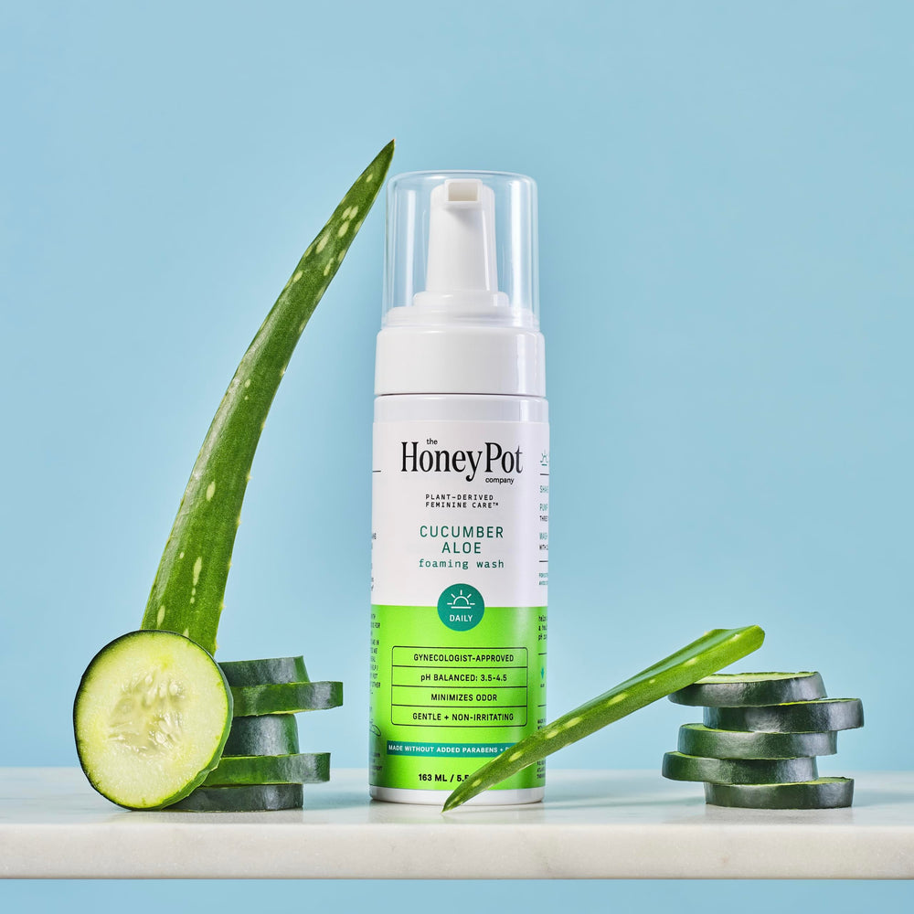 The Honey Pot Company ingredients closeup cucumber aloe, ideal for soothing sensitive skin.
