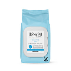 The Honey Pot Sensitive Feminine Wipes packaging conveys travel-ready freshness.