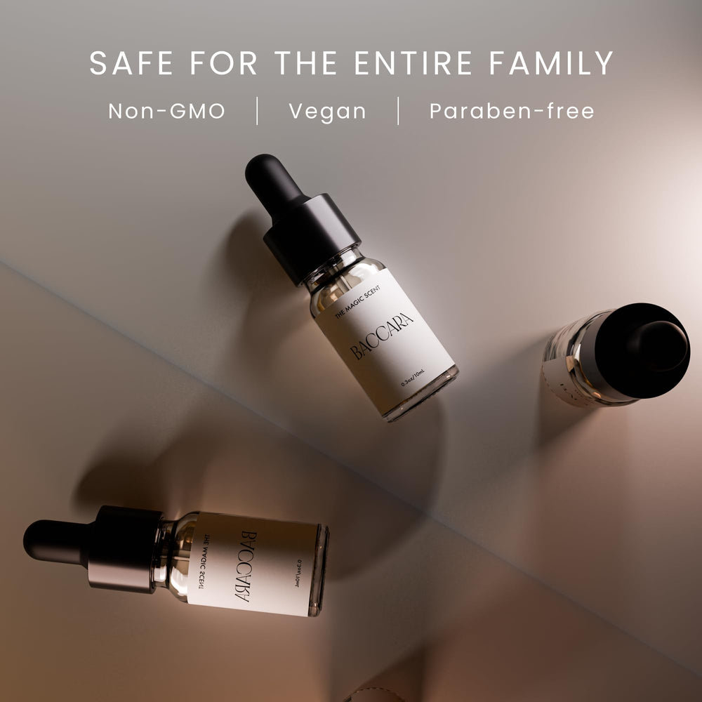 Baccara Diffuser Oil bottle with amber liquid on a luxury table