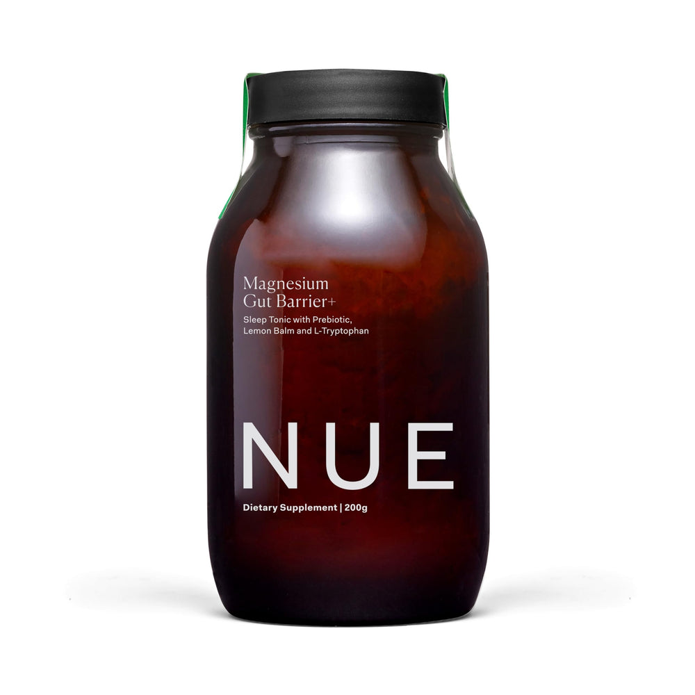 The Nue Co Magnesium Gut Barrier+ bottle on a clean surface