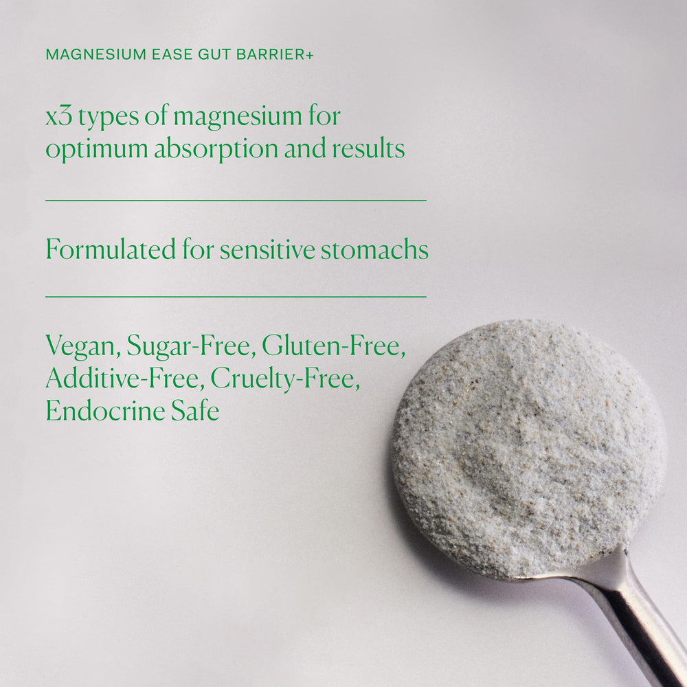The Nue Co Magnesium Gut Barrier+ displayed on a nightstand
