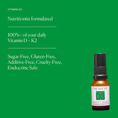 A hand applying The Nue Co Vitamin D Spray for daily use