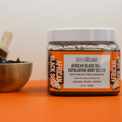 Scoop action with The Spathecary Grapefruit Orange Mimosa scrub on skin.