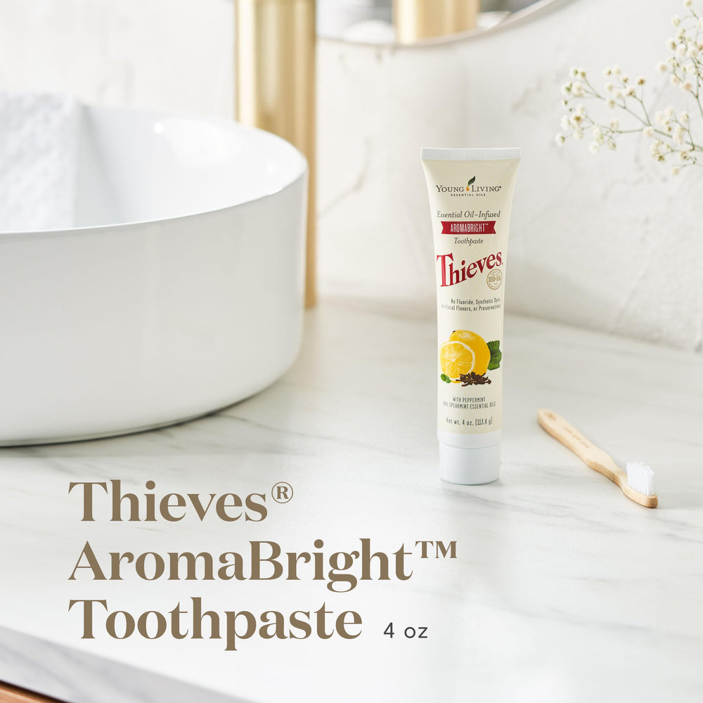 Close-up of Thieves AromaBright Toothpaste label with Young Living logo