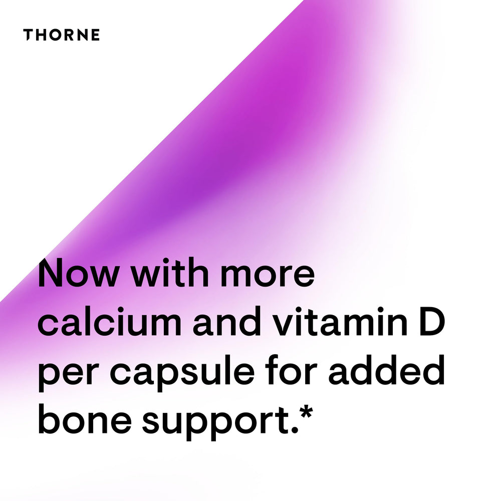 Postmenopausal woman holding Thorne Advanced Bone Support
