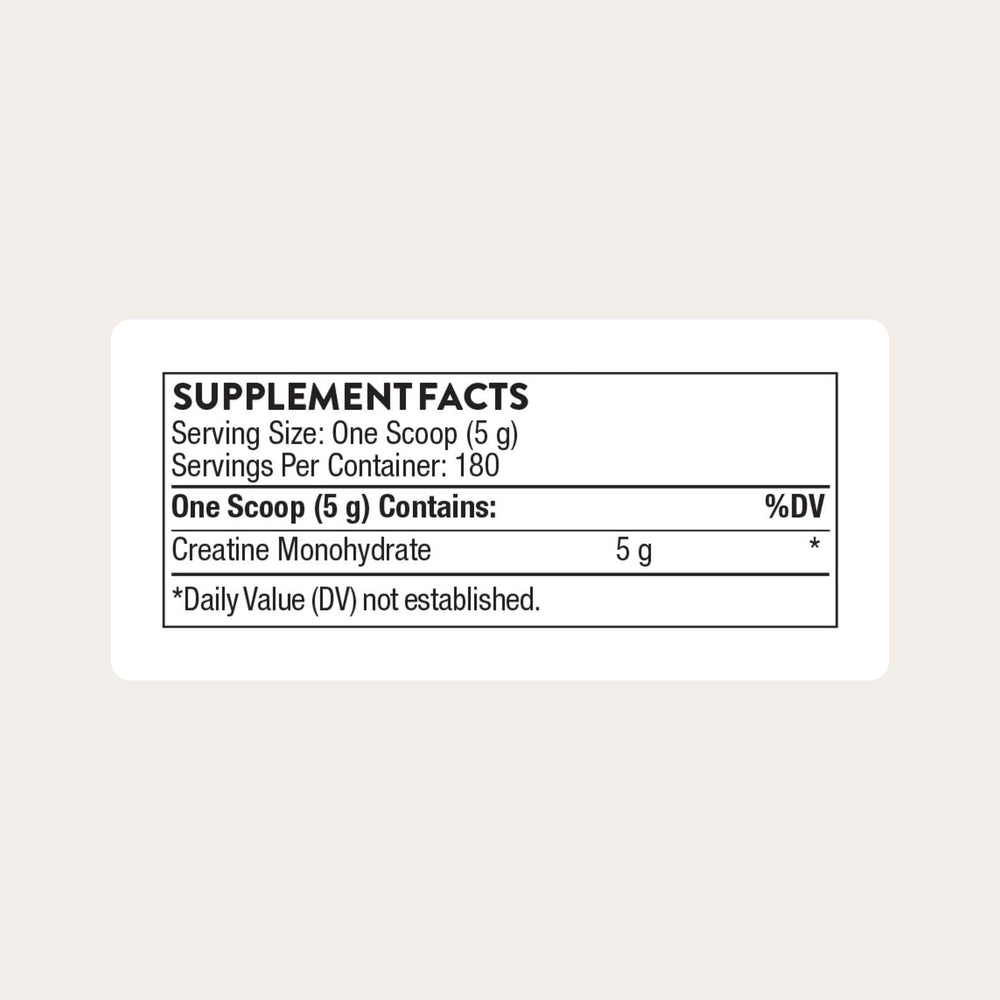 THORNE Creatine powder tub close-up shows fine particles for easy mixing.