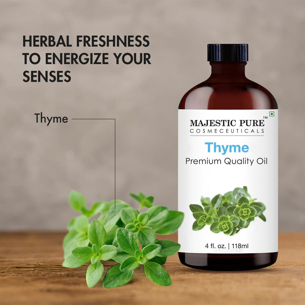 Thyme essential oil in amber glass bottle with dropper