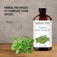 Thyme essential oil in amber glass bottle with dropper