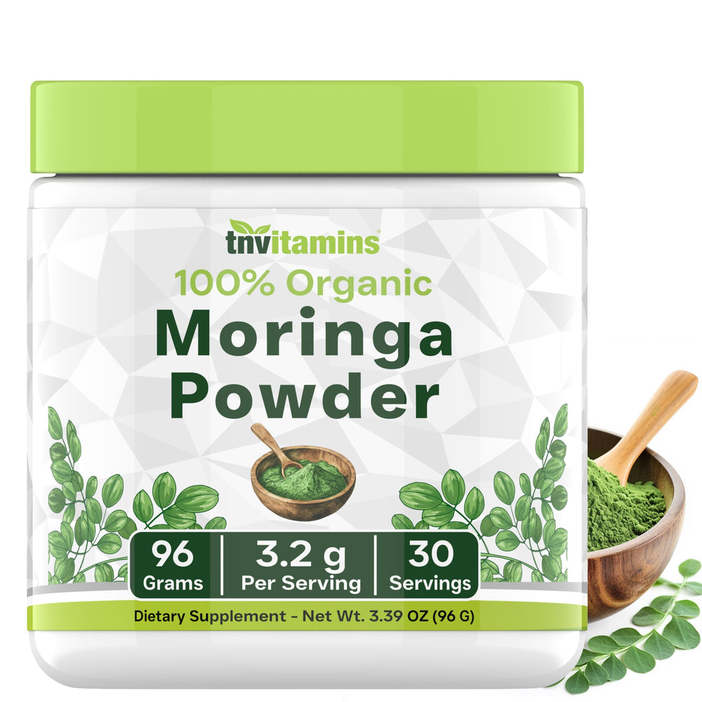 Close-up of tnvitamins Organic Moringa Powder in a scoop