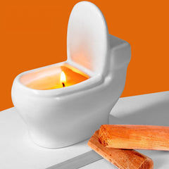 Toilet-shaped scented candle in white ceramic design, 6oz