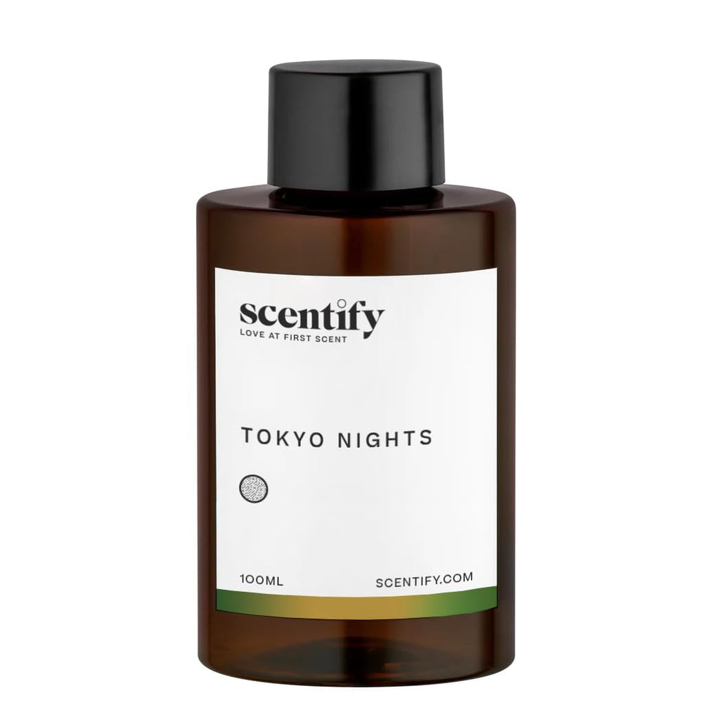 Close-up of Tokyo Nights diffuser oil refill bottle in amber glass