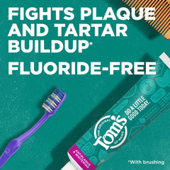 Close-up of toothpaste tube with spearmint flavor