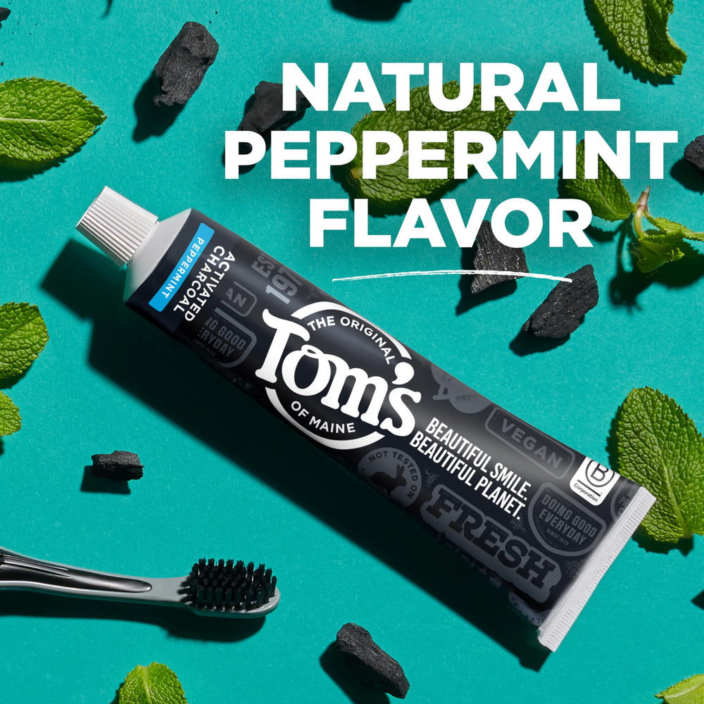 Tom's of Maine toothpaste 3-pack placed by a bathroom setup