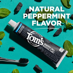 Tom's of Maine toothpaste 3-pack placed by a bathroom setup