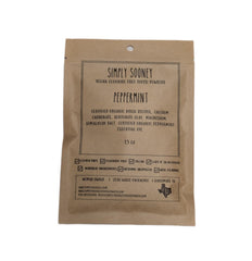 Peppermint remineralizing tooth powder in compostable packaging