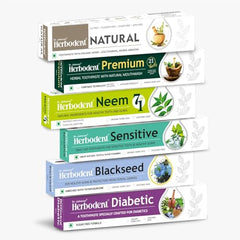 Close-up of Herbodent toothpaste tubes showing 6 variants in the 3.53oz pack