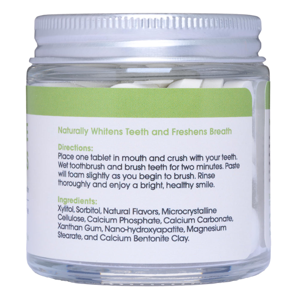 Travel-friendly toothpaste tablets packaging in glass jar