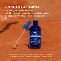 Trace Minerals Ionic Magnesium brain-health implication shown with user at desk.