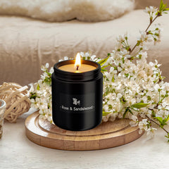 Side view of TranquilBliss Rose & Sandalwood candle in black jar