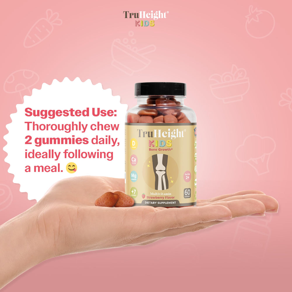 Smiling child with TruHeight strawberry gummies for bone health