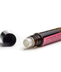Elegant glass bottle of Truly Patchouli Roll On