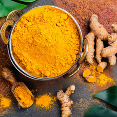 Turmeric curcumin capsules close-up with 730-count bottle