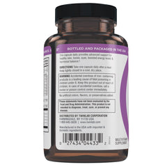 Lifestyle: woman taking daily vitamins with Twinlab TWL Women's Daily One bottle