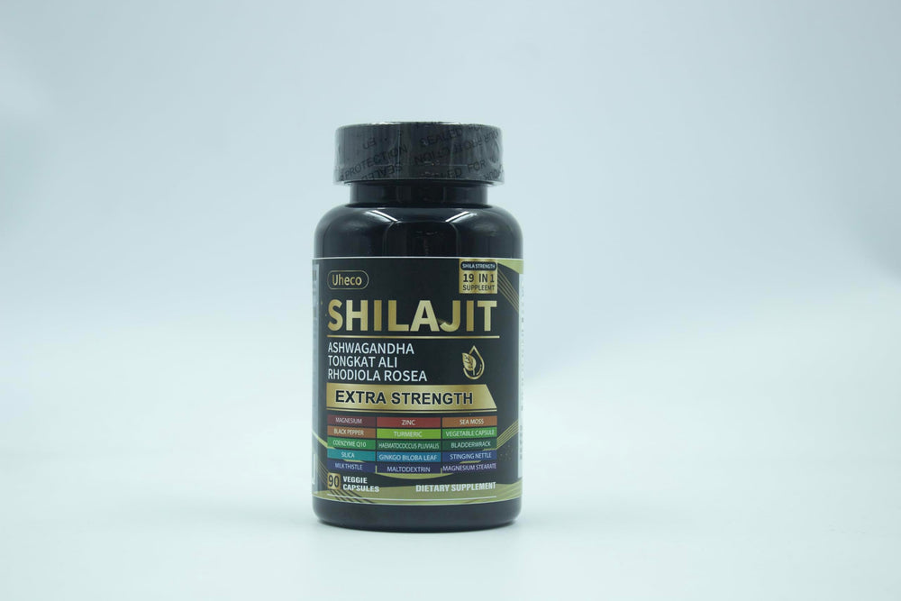 Capsules spilling beside herbal ingredients