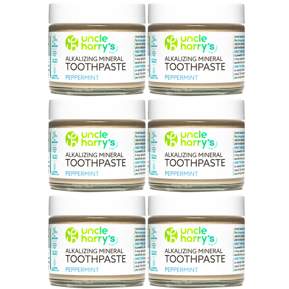 Six 3 oz glass jars of Uncle Harry's Peppermint toothpaste in a pack (6 jars).