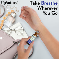 Roll-on bottle with natural essential oils and leaves