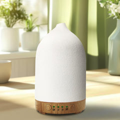 Vasysvi essential oil diffuser with white ceramic cover providing calm ambience