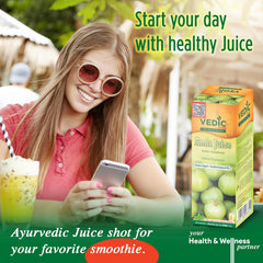 Back view with nutrition panel of Vedic Juices Amla Juice 1L bottle