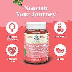 Pregnant woman taking a vegan prenatal gummy