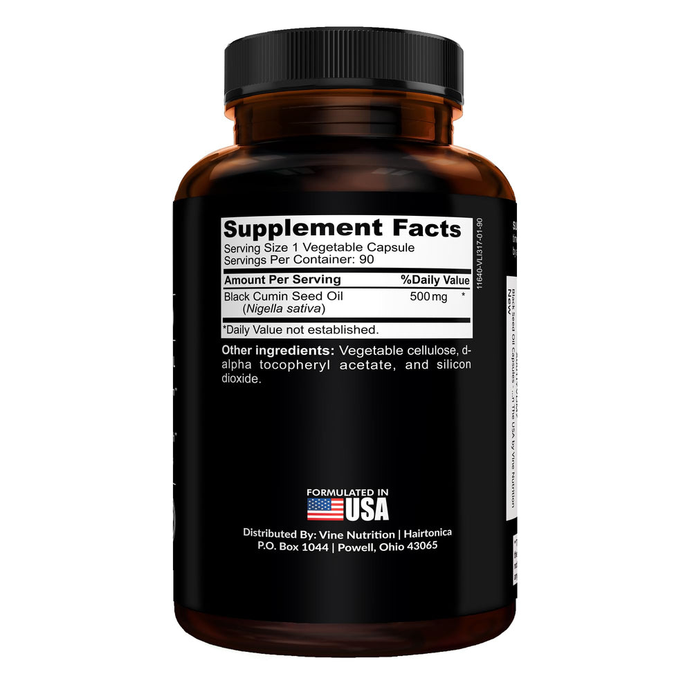 Close-up of a single 500 mg Nigella sativa softgel capsule