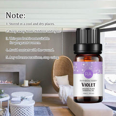 Violet essential oil bottle label and dropper cap close-up