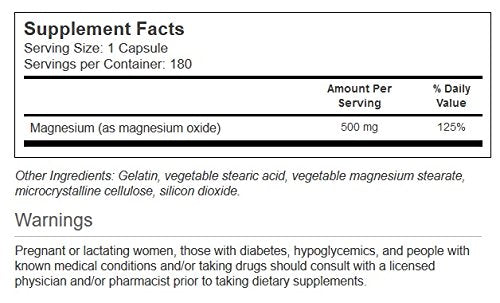Close-up of Vitacost Magnesium bottle labeling showing 500 mg per capsule