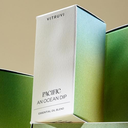 Diffuser with Pacific Balance essential oil being added (15 drops recommended)