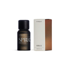 Spruce essential oil shown with diffuser