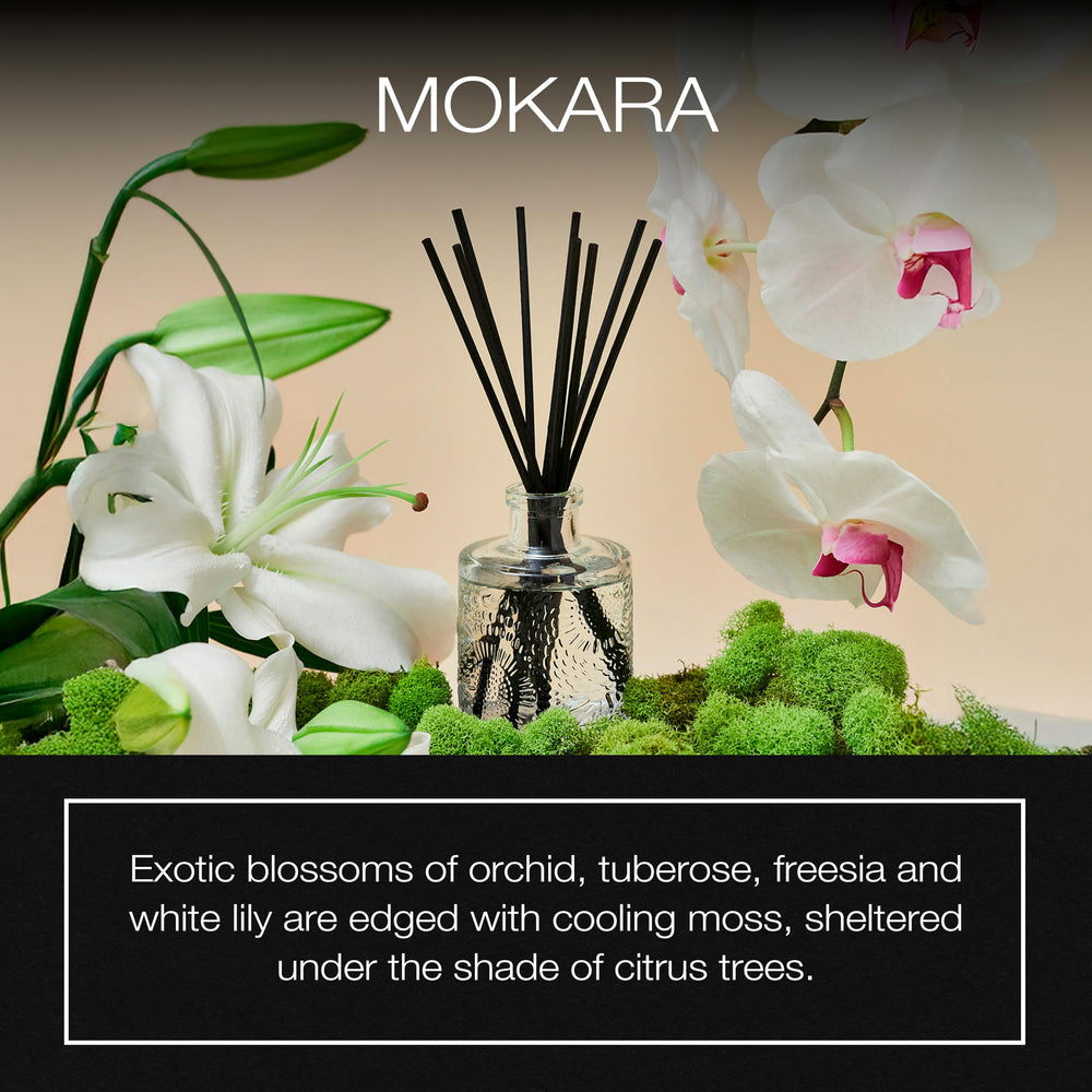 Close-up of Mokara reed diffuser glass vessel