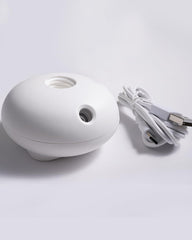 VTS Waterless Essential Oil Diffuser – palm-sized portable aromatherapy device
