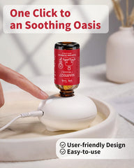 Product shot of palm-sized waterless diffuser in use