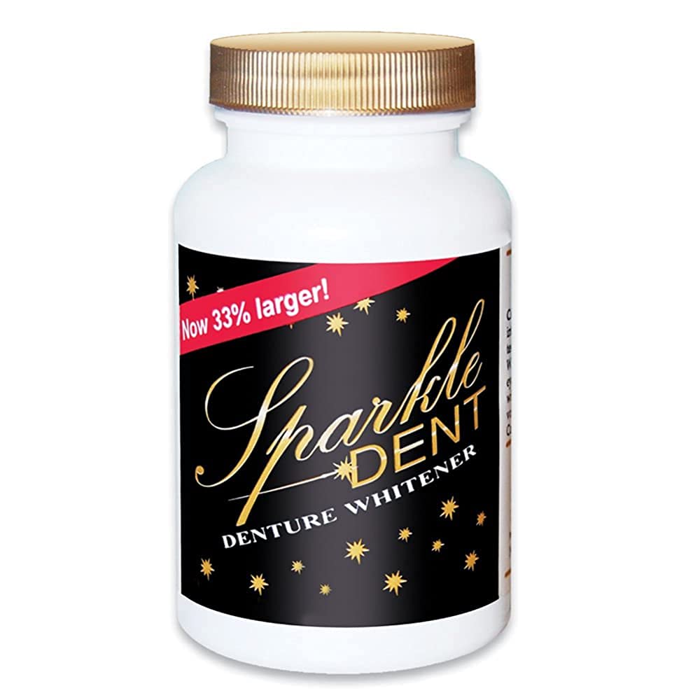 Denture cleaner tablet dissolving in water for Sparkle Dent