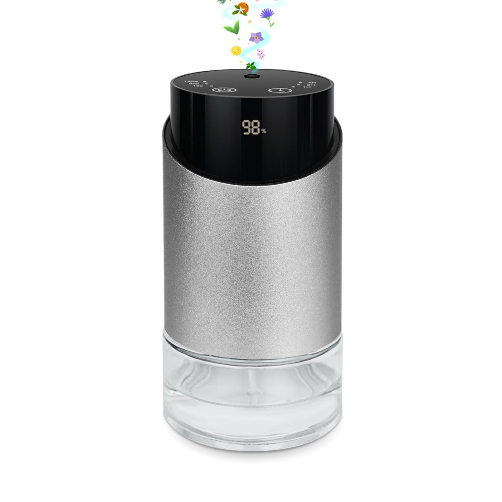 Waterless essential oil diffuser with cylindrical metal body and glass base.