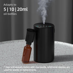 Diffuser placed in a car cup holder for travel use
