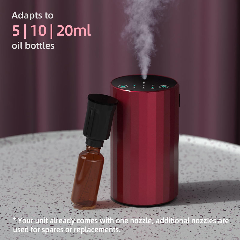 Red waterless diffuser on a desk or table
